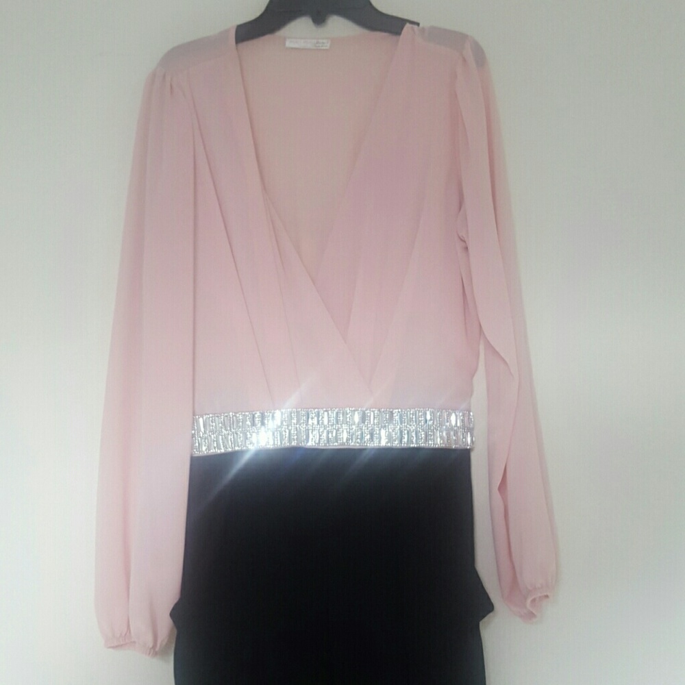 Pink and black jumpsuit w/rhinestones belt.